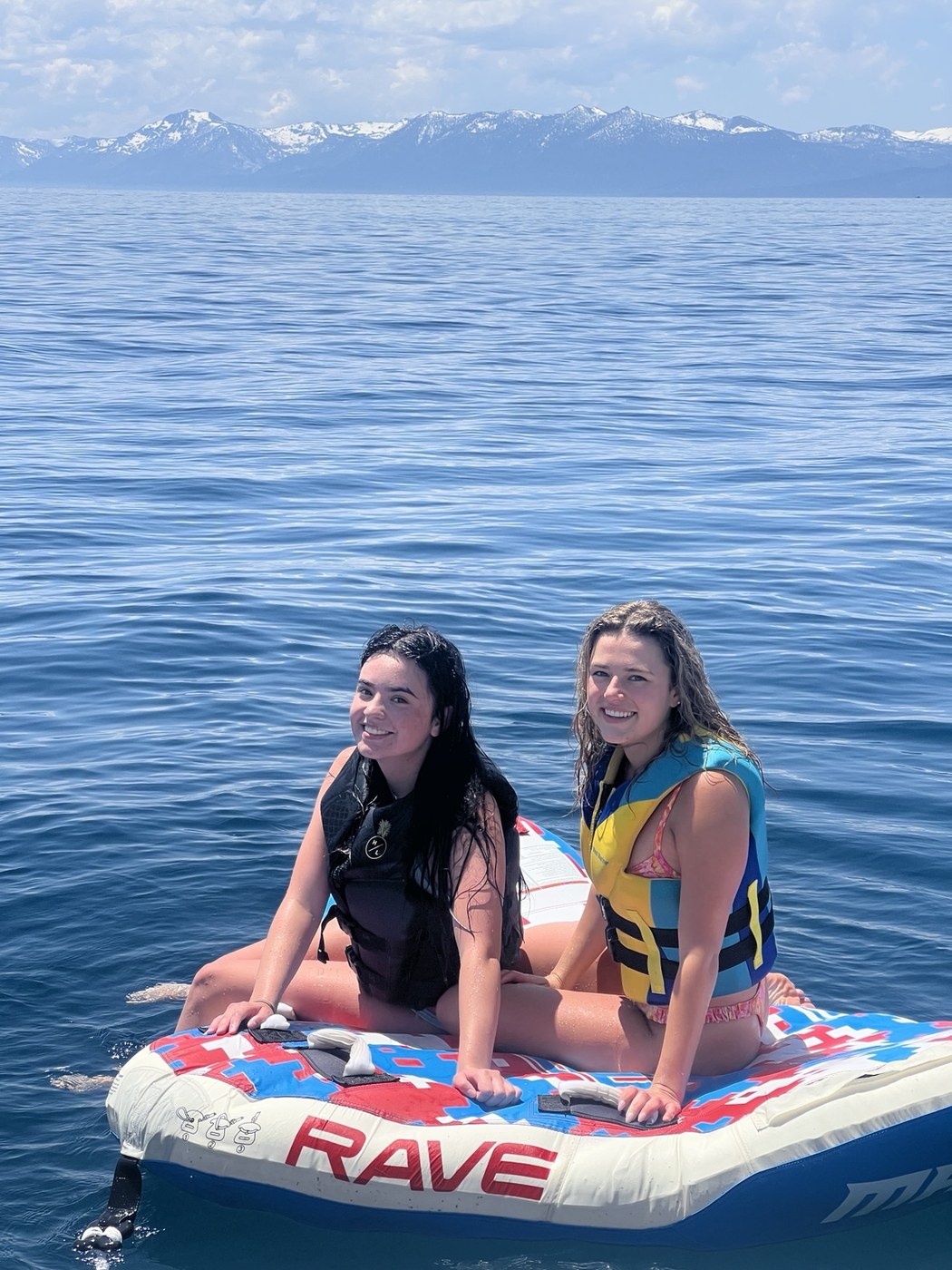 Family and friends floating on Lake Tahoe